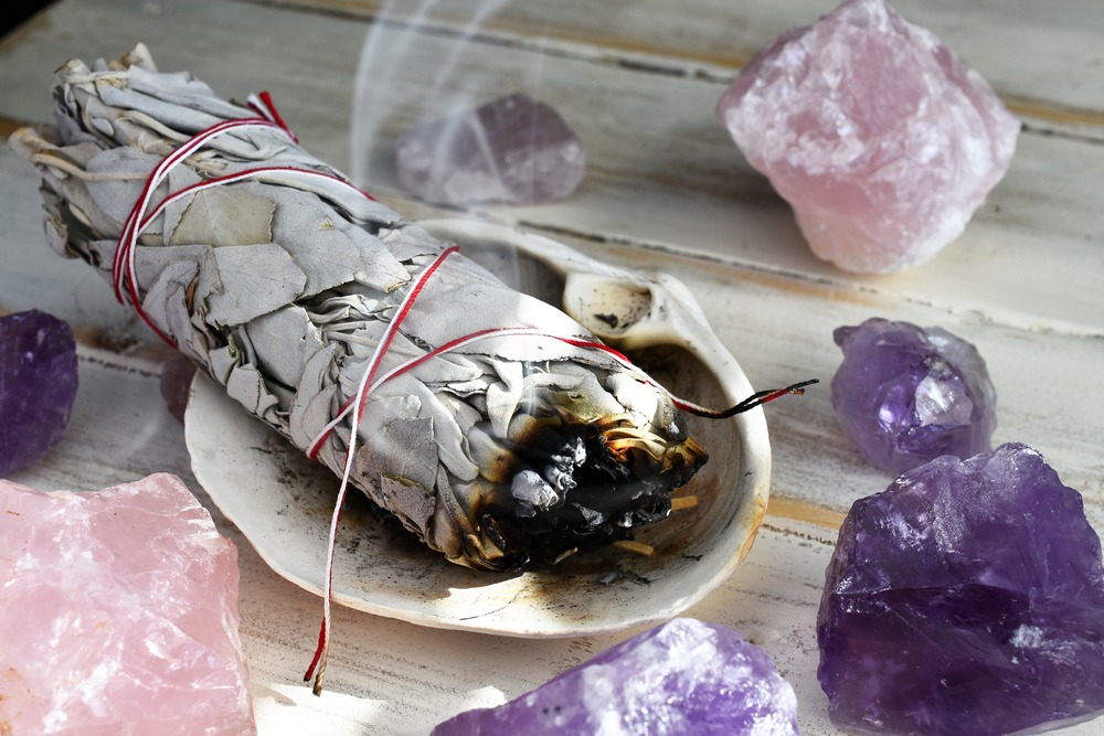 smudging with crystals and white sage