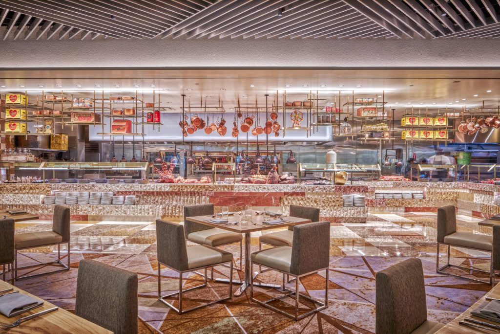 Inside the Bacchanal Buffet with tables and chairs positioned in the dining area