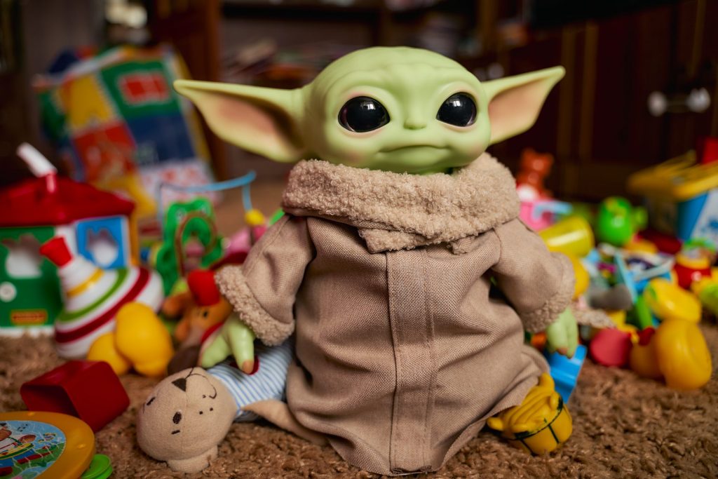 baby yoda toy from star wars/ shutterstock