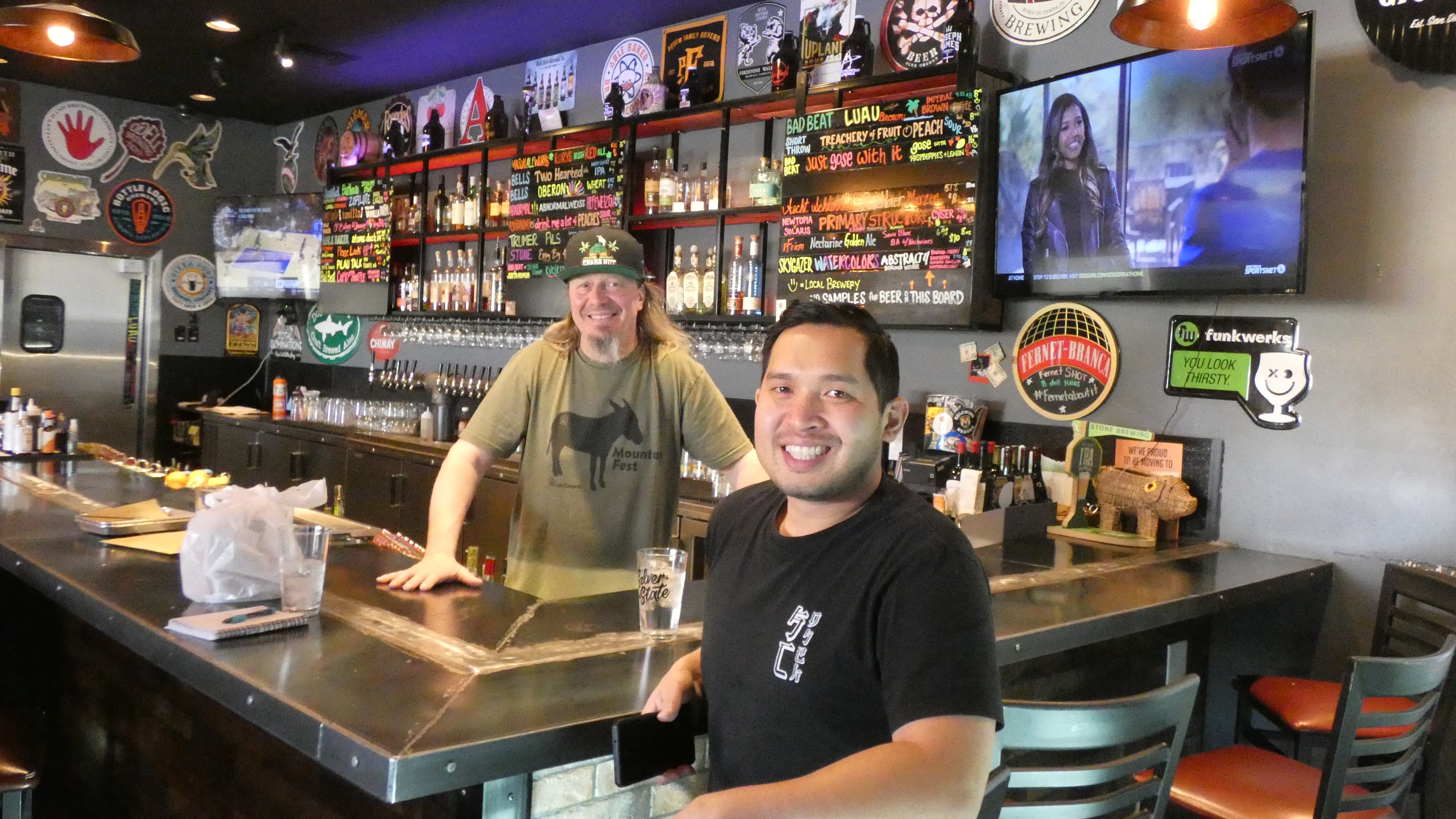 595 Craft and Kitchen owner Van-Alan Nguyen by bar top in his restaurant and bar