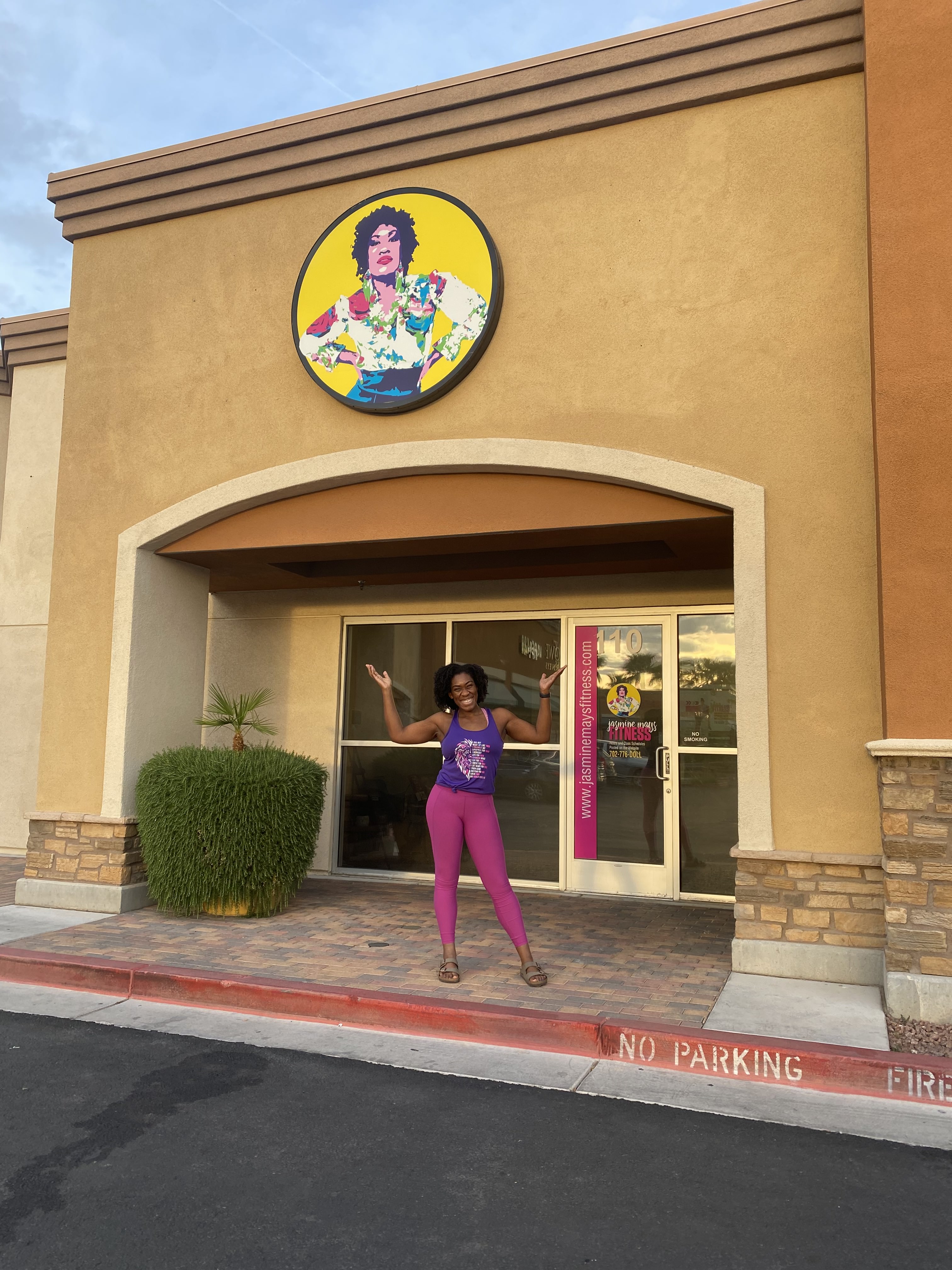 Jasmine Mays Fitness standing in front of her space in Las Vegas