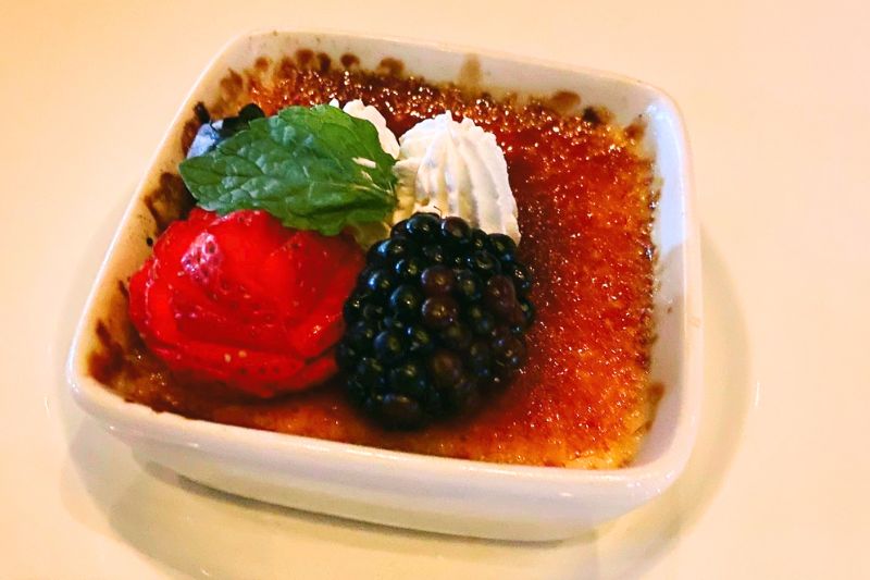 Crème Brûlée dessert on Particle Ink menu at Todd English Hotel restaurant