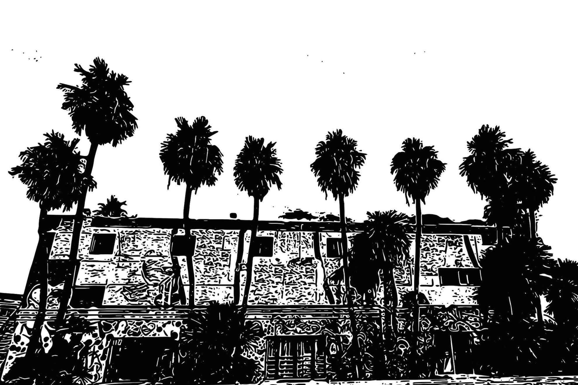 Vegas Punk Rock Museum exterior in black and white with palm trees