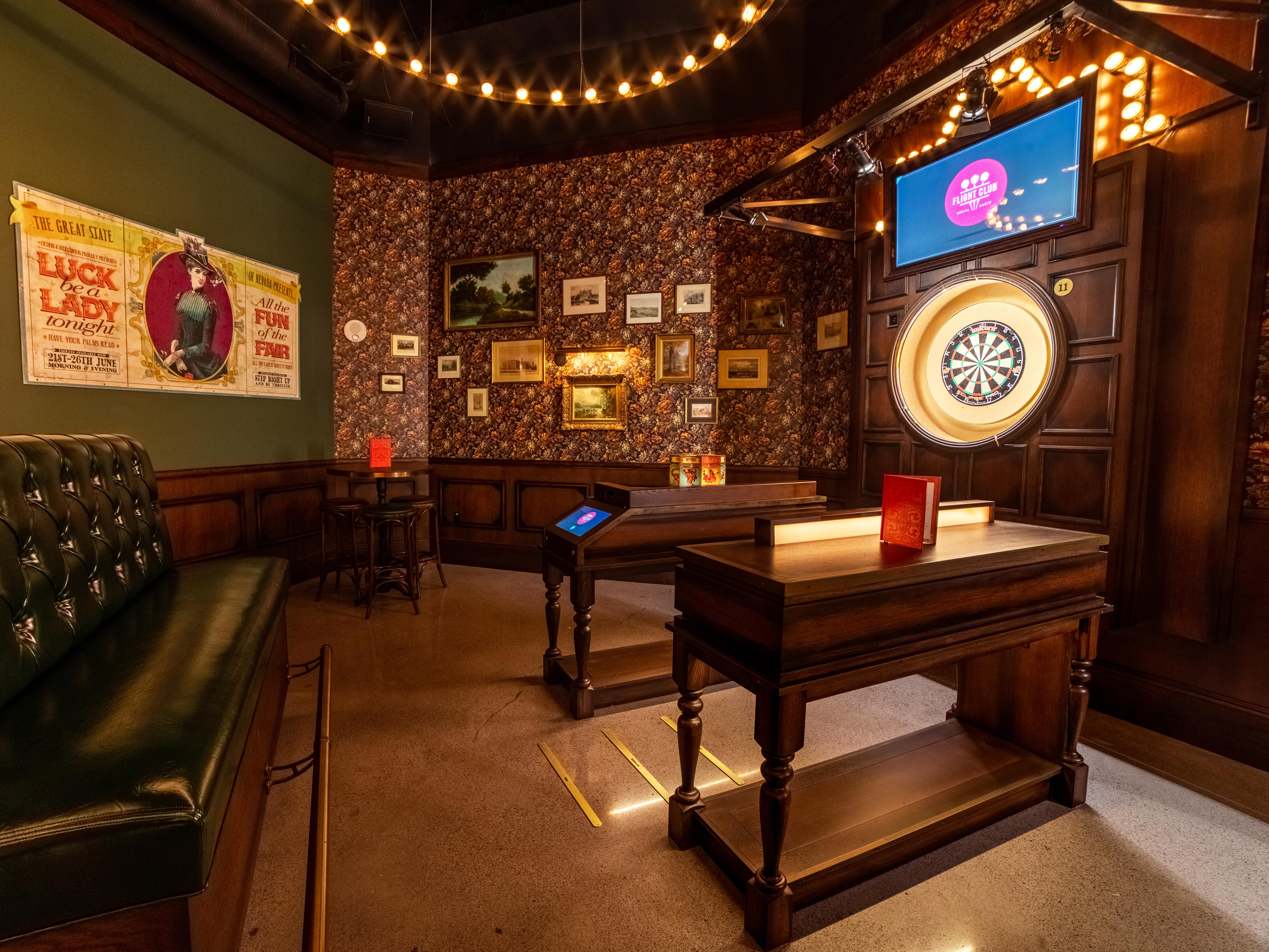 semi-private dart board room for guests to play games at Flight Club