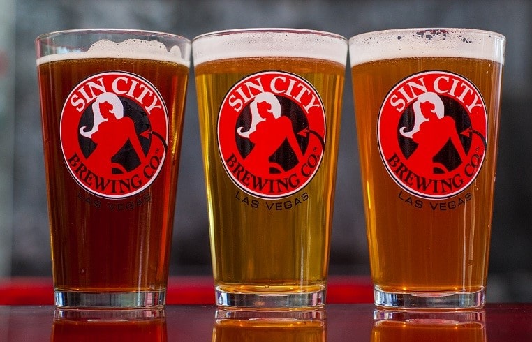 Sin City Brewing three pint glasses of beer