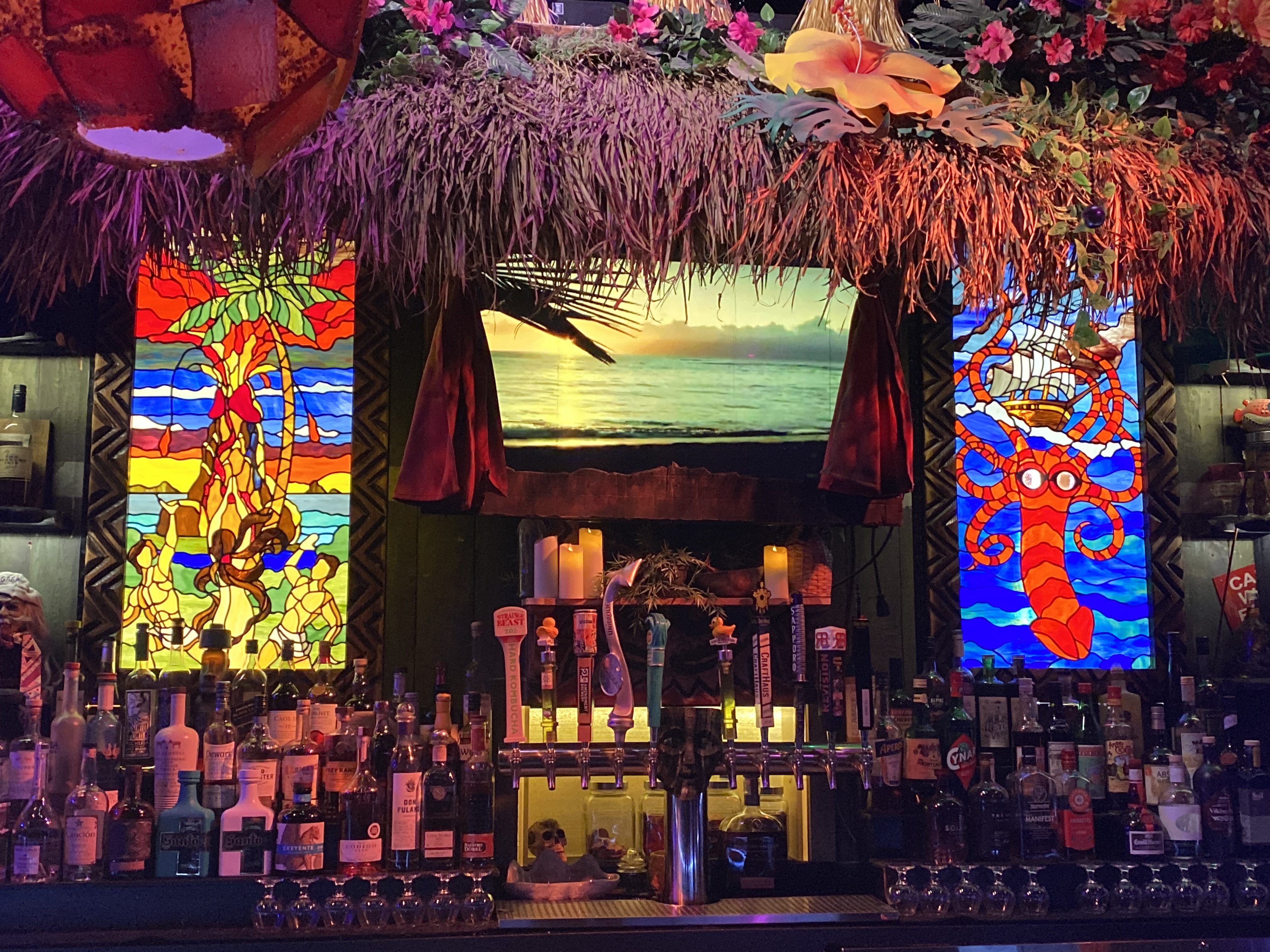 taps and backdrop of Golden Tiki